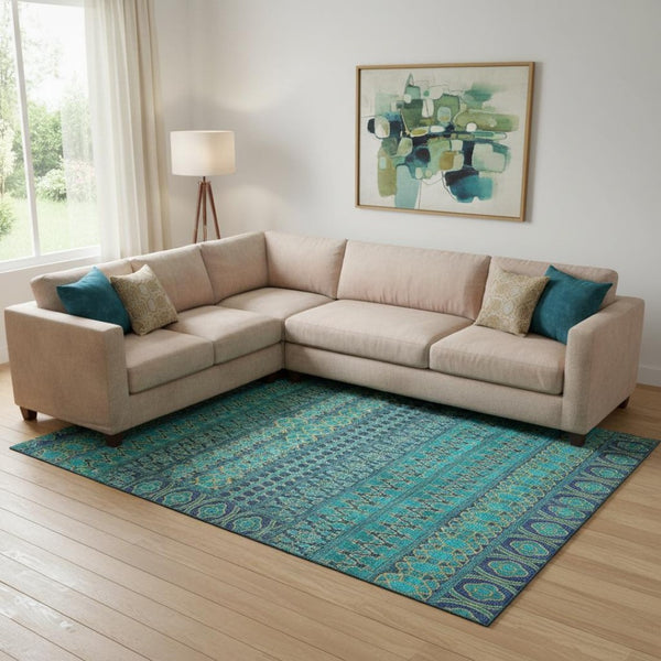HomeRoots 9' X 12' Teal and Gold Ikat Area Rug – Washable, Stain Resistant, UV Protected for Modern Spaces 661484