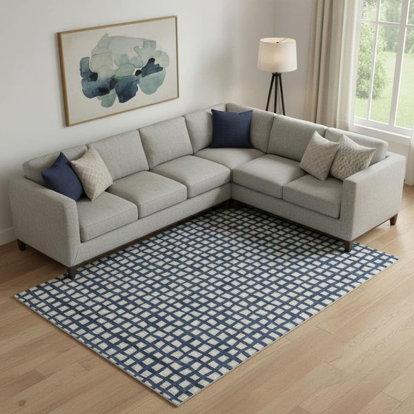 HomeRoots 9' X 12' Blue And Ivory Geometric Area Rug - Washable, Stain Resistant, UV Protected for Modern Spaces 661496