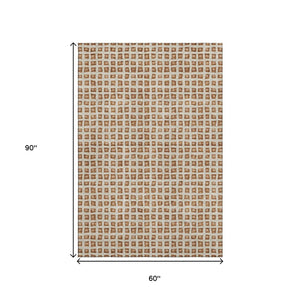 HomeRoots 5' X 8' Stylish Rust Copper & Beige Geometric Area Rug - Washable, UV Protected, Perfect for Families 661535