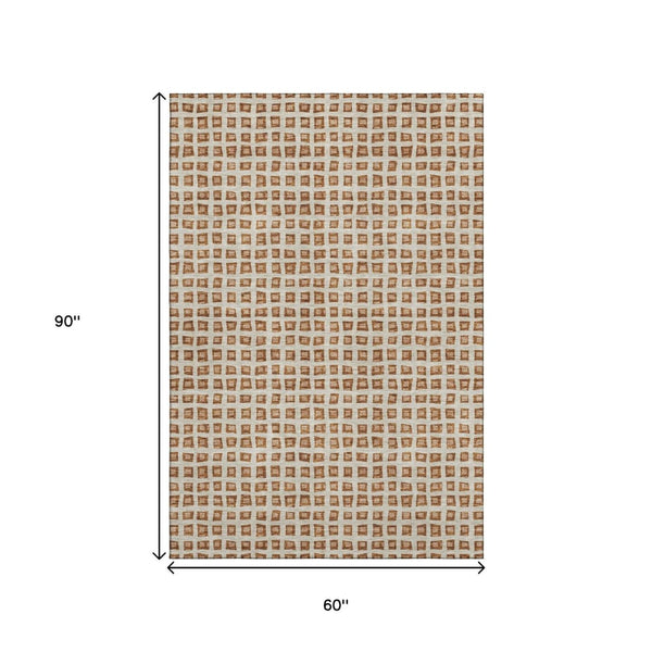 HomeRoots 5' X 8' Stylish Rust Copper & Beige Geometric Area Rug - Washable, UV Protected, Perfect for Families 661535
