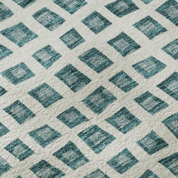 HomeRoots 8' Teal And Ivory Geometric Washable Round Rug – Durable, Stain Resistant, UV Protected for Modern Spaces 661542