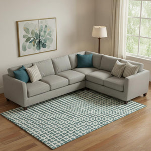 HomeRoots 9' X 12' Teal & Ivory Geometric Area Rug - Durable, Washable, UV-Protected for High-Traffic Spaces 661544