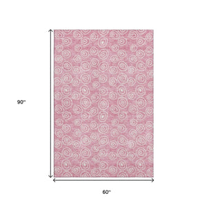 HomeRoots 5' X 8' Pink and Ivory Polka Dot Washable Area Rug - Stylish, Durable, UV Protected for Family Spaces 661601