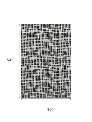 HomeRoots 5' X 8' Striped Black And Ivory Washable Area Rug - Durable, UV Protection, Perfect for Active Homes 661625