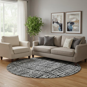 HomeRoots 8' Black And Ivory Striped Round Rug - Washable, UV Protected, Stain Resistant, Durable for High Traffic Areas 661626