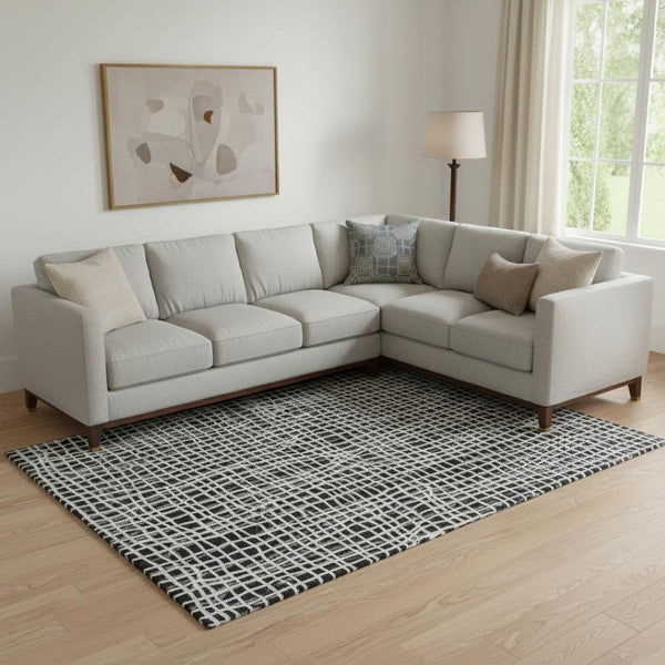 HomeRoots 10' X 14' Black And Ivory Striped Area Rug - Durable, Stain-Resistant, UV Protected for Versatile Spaces 661629
