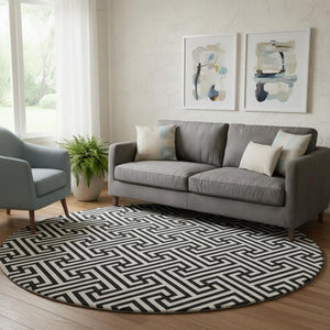 HomeRoots 8' Black And Ivory Geometric Round Rug - Washable, UV Protected, Durable, Ideal for Family Spaces 661782