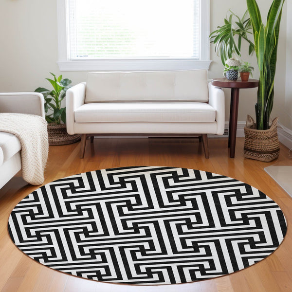 HomeRoots 8' Black And Ivory Geometric Round Rug - Washable, UV Protected, Durable, Ideal for Family Spaces 661782