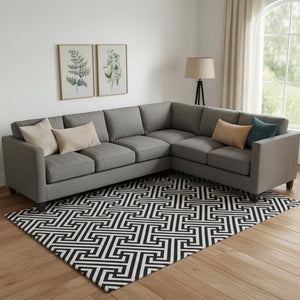 HomeRoots 8' X 10' Black and Ivory Geometric Area Rug – Washable, UV Protected, Stylish for Family Spaces 661783