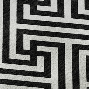 HomeRoots 8' X 10' Black and Ivory Geometric Area Rug – Washable, UV Protected, Stylish for Family Spaces 661783
