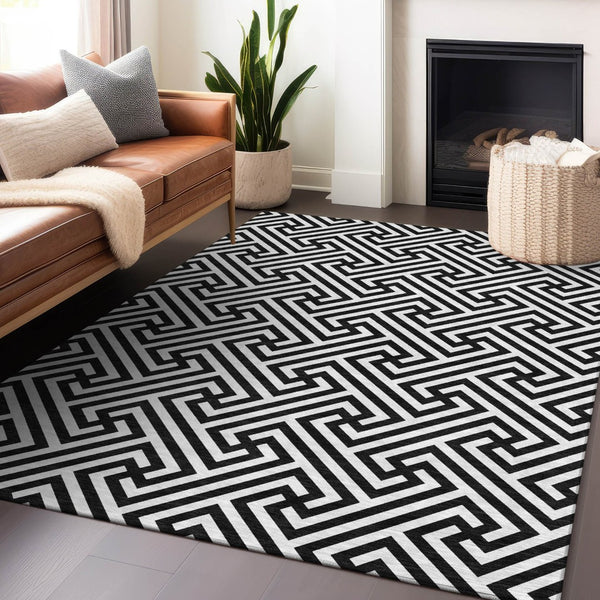 HomeRoots 8' X 10' Black and Ivory Geometric Area Rug – Washable, UV Protected, Stylish for Family Spaces 661783