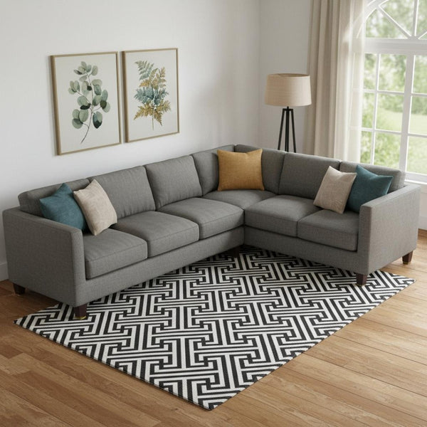 HomeRoots 10' X 14' Black and Ivory Geometric Area Rug – Washable, UV Protected, Ideal for High-Traffic Homes! 661785