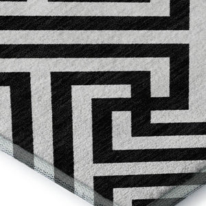 HomeRoots 10' X 14' Black and Ivory Geometric Area Rug – Washable, UV Protected, Ideal for High-Traffic Homes! 661785
