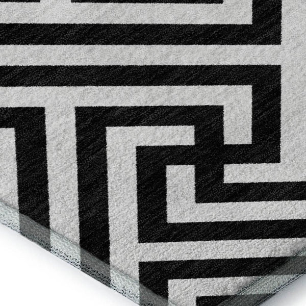 HomeRoots 10' X 14' Black and Ivory Geometric Area Rug – Washable, UV Protected, Ideal for High-Traffic Homes! 661785