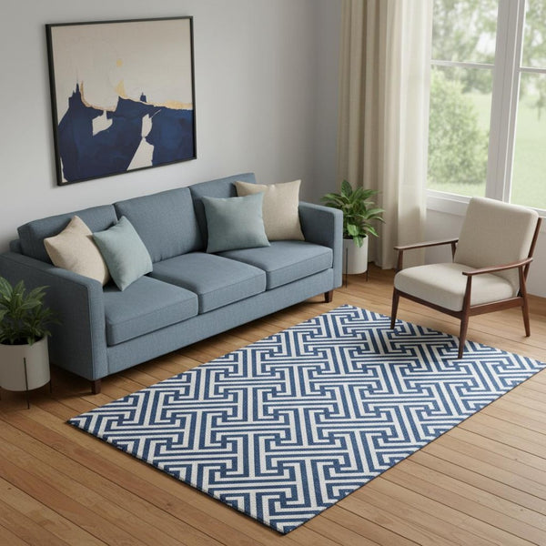 HomeRoots 5' X 8' Blue and Ivory Geometric Washable Area Rug with UV Protection for Modern Homes & Families 661787