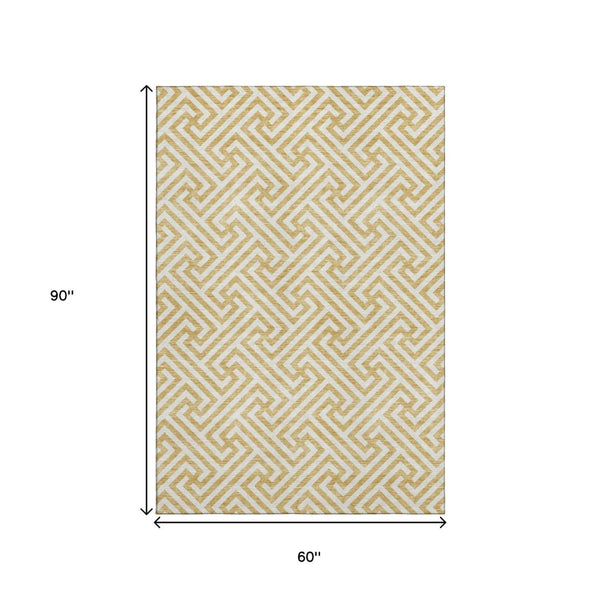 HomeRoots 5' Gold and Ivory Geometric Area Rug - Washable, UV Protected, Stylish for Living Rooms & More! 661799