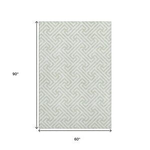 HomeRoots 5' X 8' Stylish Mint Green & Ivory Geometric Area Rug - Washable, UV-Protected, Durable Design! 661823