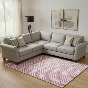 HomeRoots 10' X 14' Pink Geometric Area Rug – Washable, UV Protected & Stain-Resistant for Family Spaces 661839