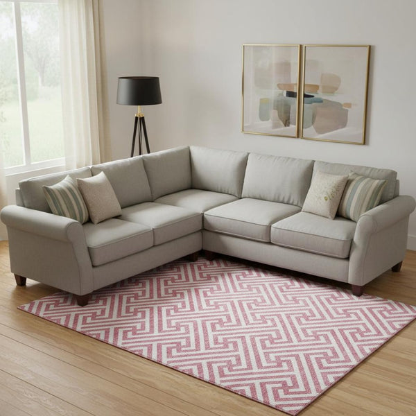 HomeRoots 10' X 14' Pink Geometric Area Rug – Washable, UV Protected & Stain-Resistant for Family Spaces 661839