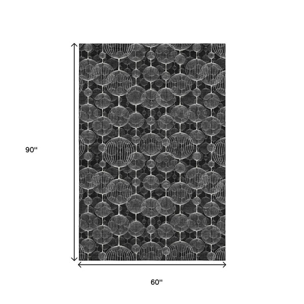 HomeRoots 5' Black and Ivory Geometric Area Rug - Washable, UV Protected, Soft, and Stain Resistant for Homes 661877