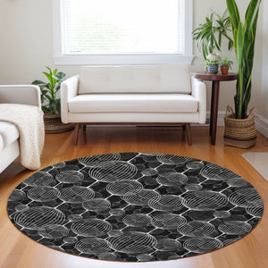 HomeRoots 8' Black And Ivory Geometric Washable Round Rug – Durable, Stain-Resistant, UV-Protected, Stylish Décor! 661878