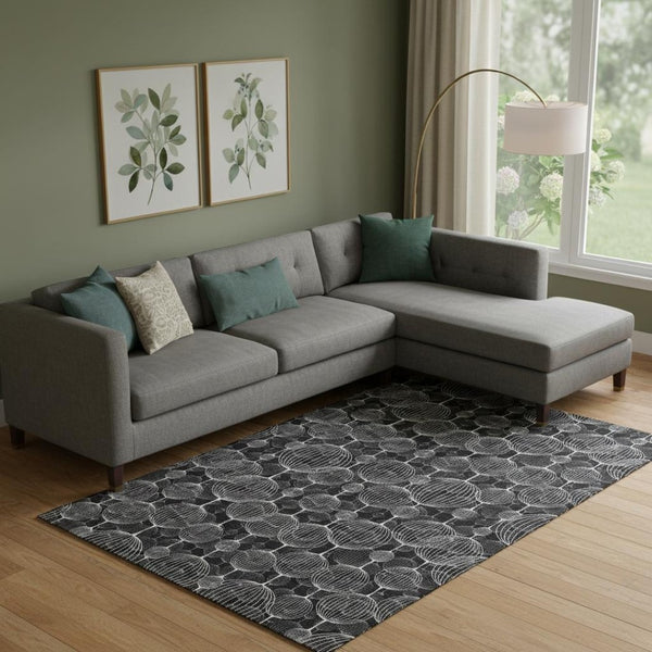HomeRoots 9' X 12' Black And Ivory Geometric Area Rug - Stylish, Washable, UV-Protected for Modern Spaces 661880