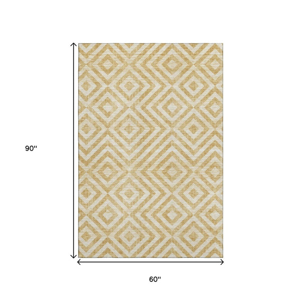HomeRoots 5' X 8' Gold and Ivory Geometric Area Rug - Stylish, Washable, UV Protected for High Traffic Spaces 661925