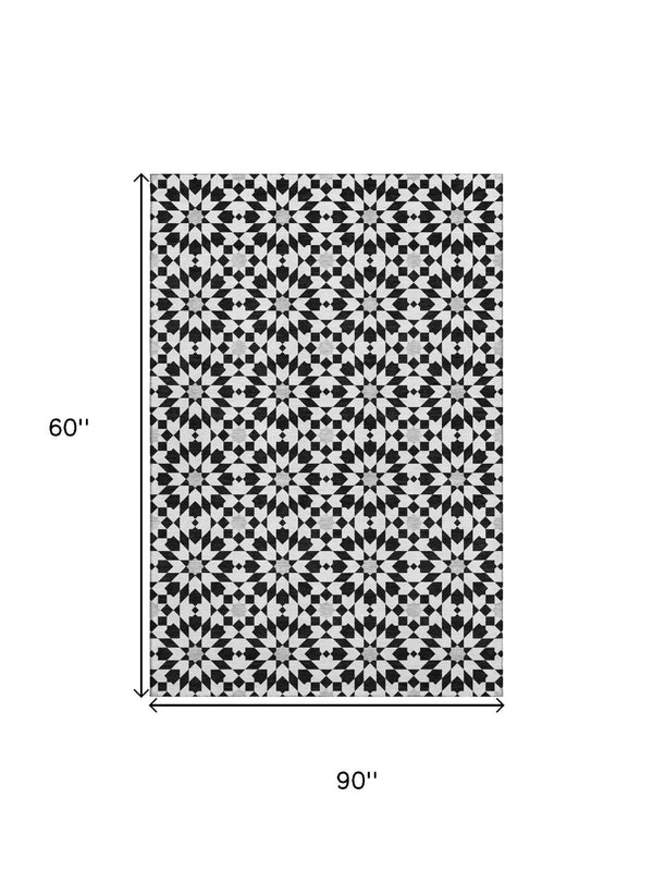 HomeRoots 5' X 8' Black And Silver Geometric Area Rug – Washable, UV Protected, Modern Style for Busy Homes 661985
