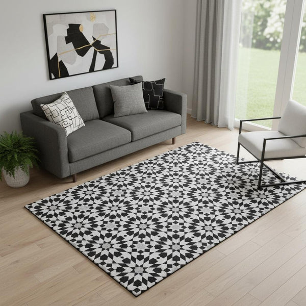 HomeRoots 5' X 8' Black And Silver Geometric Area Rug – Washable, UV Protected, Modern Style for Busy Homes 661985