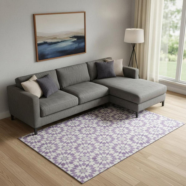 HomeRoots 9' X 12' Lavender Geometric Area Rug - Washable, UV Protected, Soft, Stain Resistant for Active Homes 662030