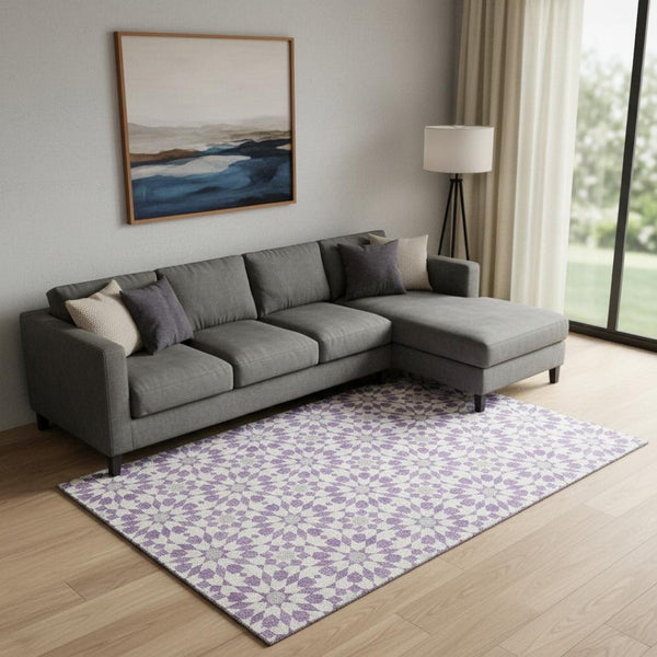 HomeRoots 9' X 12' Lavender Geometric Area Rug - Washable, UV Protected, Soft, Stain Resistant for Active Homes 662030