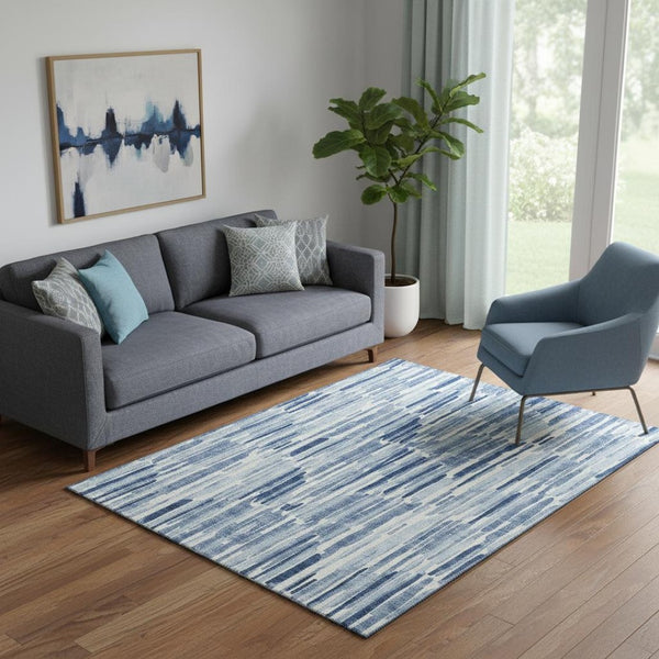 HomeRoots 5' X 8' Blue and Ivory Abstract Washable Area Rug with UV Protection for Stylish, Durable Spaces 662285