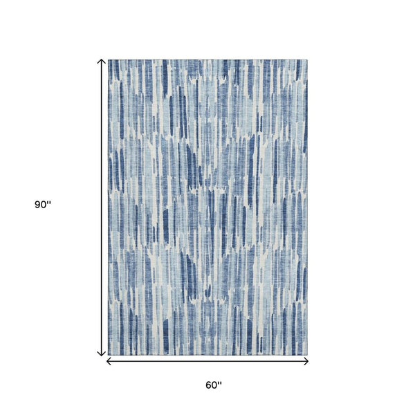 HomeRoots 5' X 8' Blue and Ivory Abstract Washable Area Rug with UV Protection for Stylish, Durable Spaces 662285