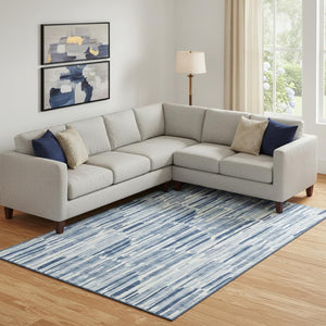 HomeRoots 10' X 14' Blue And Ivory Abstract Area Rug - Washable, UV-Protected, Stylish & Durable for Any Room 662289