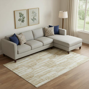 HomeRoots 9' X 12' Gold Ivory Beige Abstract Washable Area Rug with UV Protection for Style & Durability 662294
