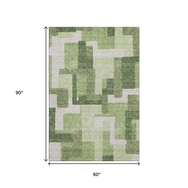 HomeRoots 5' X 8' Green and Ivory Abstract Geometric Area Rug - Washable, UV Protected, Stylish & Durable! 662437