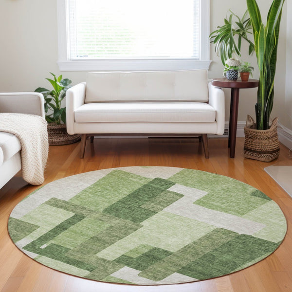 HomeRoots 8' Green and Ivory Abstract Geometric Washable Round Rug with UV Protection for Stylish Spaces 662438