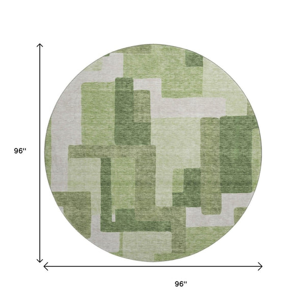 HomeRoots 8' Green and Ivory Abstract Geometric Washable Round Rug with UV Protection for Stylish Spaces 662438