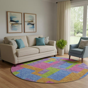 HomeRoots 8' Abstract Geometric Round Rug in Vibrant Purple, Pink & Green - Washable, UV Protected, Durable Design 662450