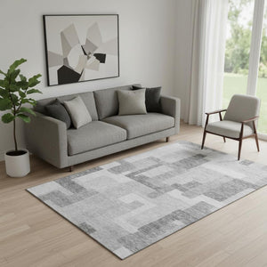 HomeRoots 5' X 8' Silver and Gray Abstract Geometric Area Rug - Washable, UV-Protected, Durable for High-Traffic Homes 662455