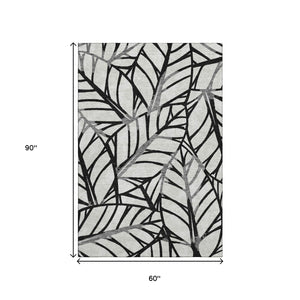 HomeRoots 5' X 8' Black & Beige Floral Area Rug - Washable, UV Protected, Stain Resistant for Easy Care 662479