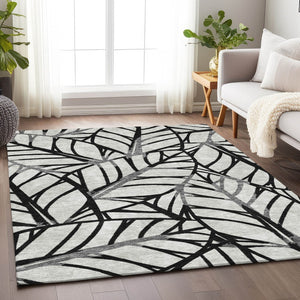 HomeRoots 10' X 14' Black and Beige Floral Washable Area Rug – Durable, UV-Protected, Stain-Resistant Design! 662483