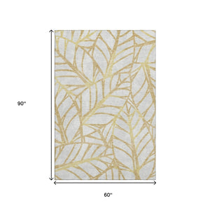 HomeRoots 5' X 8' Gold Beige Floral Area Rug - Washable, UV Protected, Easy-Care, Durable for Homes with Kids & Pets 662491