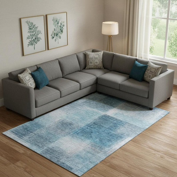 HomeRoots 9' x 12' Denim Blue and Ivory Abstract Area Rug - Durable, Washable, UV Protected for High-Traffic Areas 662566