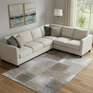 HomeRoots 9' X 12' Abstract Washable Area Rug in Silver Beige & Gray - UV Protected, Stain Resistant, Durable Design 662590