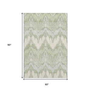 HomeRoots 5' X 8' Artichoke Green Ikat Area Rug - Durable, Washable, UV-Protected for Modern Living Spaces 662605