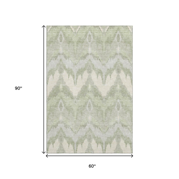 HomeRoots 5' X 8' Artichoke Green Ikat Area Rug - Durable, Washable, UV-Protected for Modern Living Spaces 662605