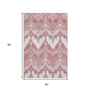 HomeRoots 5' X 8' Blush Ivory Pink Ikat Area Rug - Washable, Stain Resistant, UV Protected for Stylish Living 662623