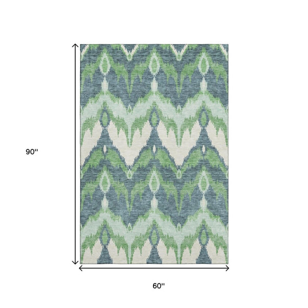 HomeRoots 5' X 8' Ikat Area Rug in Green and Ivory - Washable, Stain Resistant, UV Protected for Modern Spaces 662647