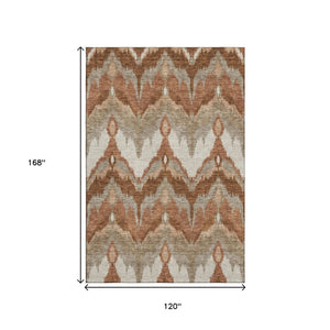 HomeRoots 10' X 14' Stylish Rust and Beige Ikat Area Rug - Durable, Washable, UV-Protected for High-Traffic Spaces 662663